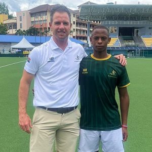 South Africa u17 coach Justin Collins congratulates Lethabo Bogacwi of DHS on his man of the match-winning performance.