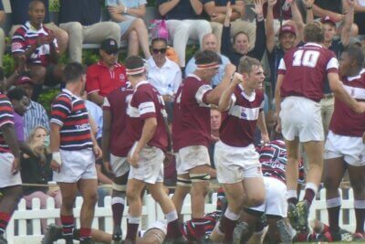 Kearsney College celebrates after driving over for the first try of the match.