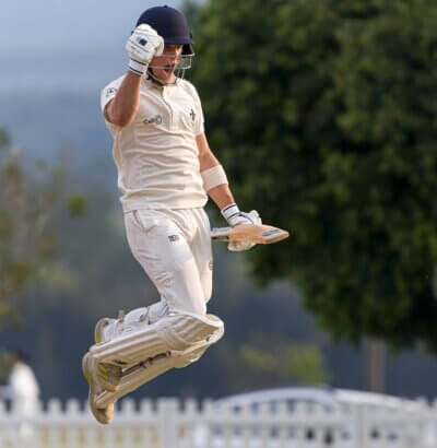 Hilton College's Charles Swart celebrates a superb century against Paul Roos Gimnasium on the Hart-Davis Oval, 23 September 2024. Photo: Justin Waldman Sports Photography.