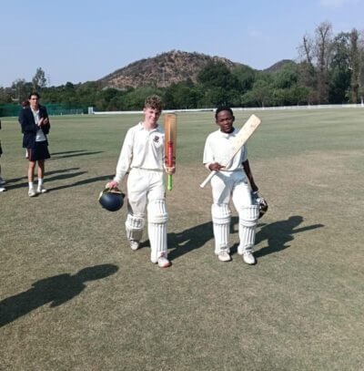 Alec Loveland and Nkosana Sibiya, of St John's, acknowledge applause for their excellent batting in a win over St Alban's College.