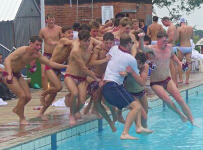 Kearsney College coach Nick Rodda is taken for a celebratory swim by his team after Kearsney clinched the 1st team title at the KZN Top 10 Water Polo Tournament.