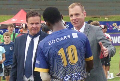 Clifton's Director of Sport, Jaco Coetzer, and Executive Headmaster, Clyde Mac Donald, congratulate DHS captain Bayanda Majola on his team's victory in the final of the Clifton T20 Tournament. Photo: Brad Morgan.