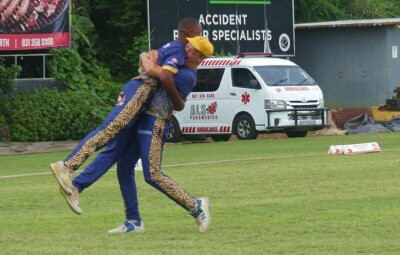 Ethan Cooper celebrated heartily with Sibusiso Msibi after Msibi pulled off a stunning catch. Photo: Brad Morgan.