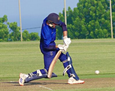 Kyle White hits the winning runs for the Northwood Knights in a W100 match against Clifton College. Photo: Brad Morgan.