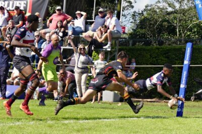 Left-wing Avumile Lisa makes the dive for five in the left-hand corner for Westville. Photo: Brad Morgan.