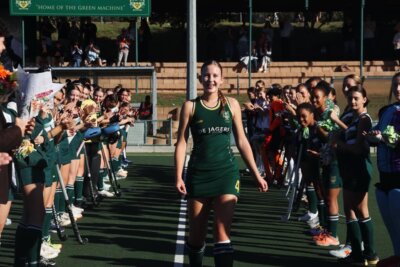  Madison Ackerman received a guard of honour as she walked out for her 100th appearance for Fairmont High School against Rustenburg Girls. Fairmont won that clash 2-1. Photo: Fairmont High School Hockey Team