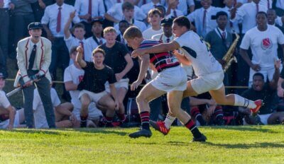 Jordan Thackeray fight off the tackle of Dresden Coetzee to score Maritzburg College's opening try against St Charles College. Photo: Justin Waldman Sports Photography.