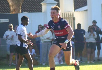 His face overcome with ecstatic joy, Westville captain Liam Simpkins runs towards his schoolmates to celebrate victory after the final whistle had sounded. Photo: Brad Morgan.