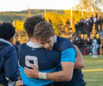 Hugs all round for St Andrew's after they completed the 2025 season with 10 wins, two draws, and only one loss. Photo: St Andrew's College on Facebook.