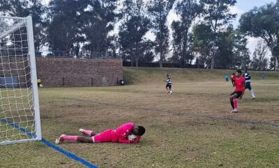 Grey College's goalkeeper pulls off a fine save, but the Bloemfontein school was eliminated in a penalty shootout in the semifinals of the Cup. Photo: Curro Sport.