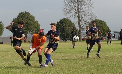Efe Ozcan sends the ball towards the back of the net to give Hilton College the lead over orthwood in the final of the Primo Big 10. Photo: Brad Morgan.