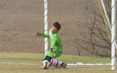 Michaelhouse goalkeeper Luke Mitchell blocks a penalty kick against Westville to keep the scores level at 1-1. Photo: Brad Morgan.