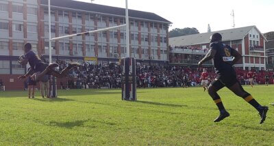 When Zenkosi Mthiyane went over for his final try for the DHS 1st XV after three years representing the side, with his captain, Daniel Ikotela, in close support, he made sure he executed a try worthy of the occasion. Photo: Brad Morgan.