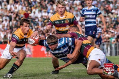 Paarl Boys' High lock Gershom Pieters powers his way through two tackles to score a try for Boishaai in their dramatic two-point win over Paarl Gimnasium. Photo: Anton Wannenburg/PhotoStories.
