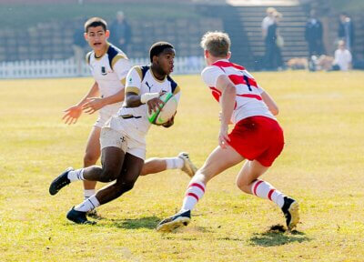 The St Charles u17A and Michaelhouse u17A teams mix it up at the St Charles Sevens, played on Old Orchards, on Saturday, 2 August. Photo: Supplied.