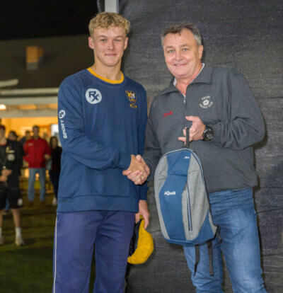 The CEO of One Insurance, Peter Mortimer, congratulates Ethan Cooper on a splendid bowling performance in the final of the Eston T20 Night League against Maritzburg College. Photo: Justin Waldman Sports Photography.