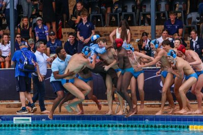 Bishops takes the champions' swim after winning the Saints Invitational Water Polo title. Photo: Debbi Adcock Photography.