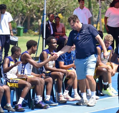 Kent VanderYacht celebrates with his players on the bench during a November 2025 win over Maritzburg College. Photo: Anele Sibhoko/Northwood.