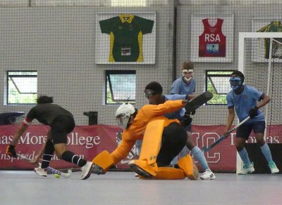 KZN Coastal A captain, Bhavesh Naicker, drags the ball beyond the reach of Northerns' goalkeeper, Reghardt Swart. Moments later, Swart brought him down and KZN Coastal was awarded a penalty stroke. Swart saved it. Photo: Brad Morgan.