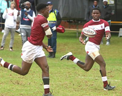 Kearsney College captain Nhlanhla Ndlovu puts Lwandle Mkhize in for the One-Stripe's third try against Hoërskool Zwartkop. Photo: Gabby Swanepoel.