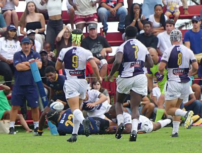 A desperate tackle jarred the ball loose from Sterling Padi to prevent DHS snatching a last-gasp win at Northwood. Photo: Brad Morgan.