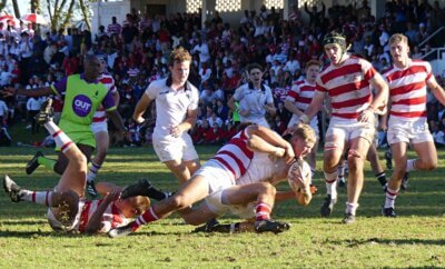 Guy Fender is dragged down just metres short of the Michaelhouse try line in the last minute of the game. Photo: Brad Morgan.