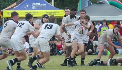 Scrumhalf Benoit Rey feeds the Hilton backline as they force Maritzburg College onto the defensive. Photo: Brad Morgan.